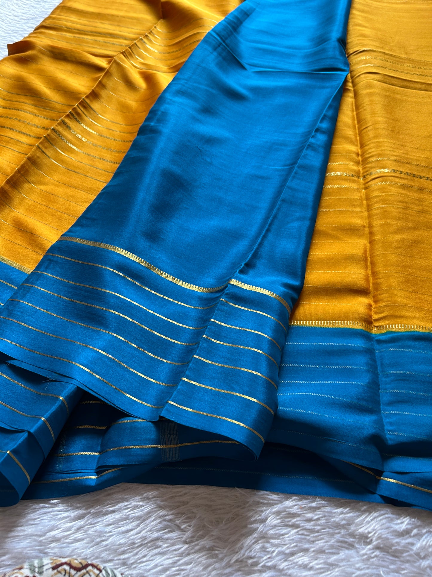 Dhaatri (2D) : Golden yellow-ink blue
