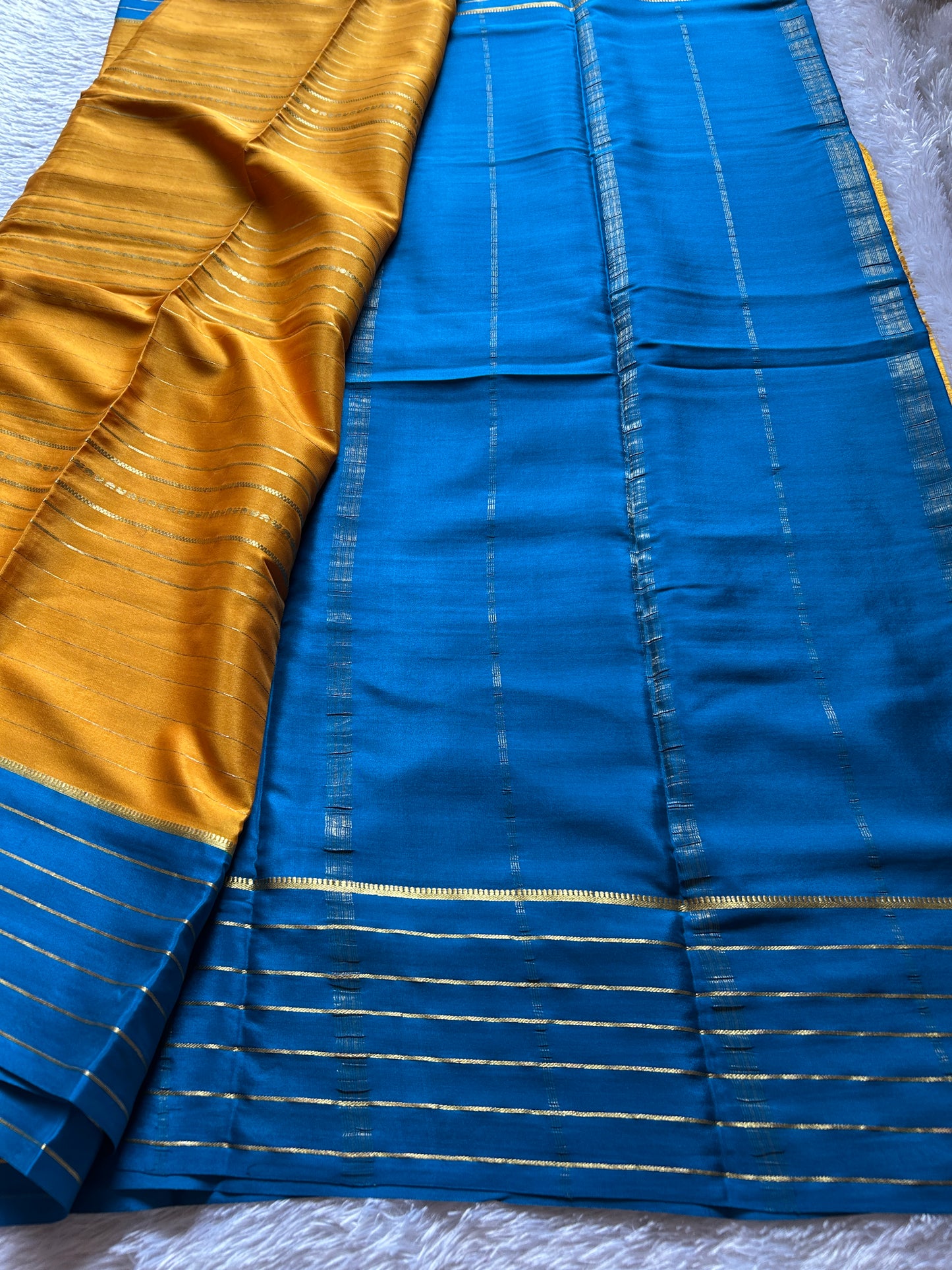 Dhaatri (2D) : Golden yellow-ink blue