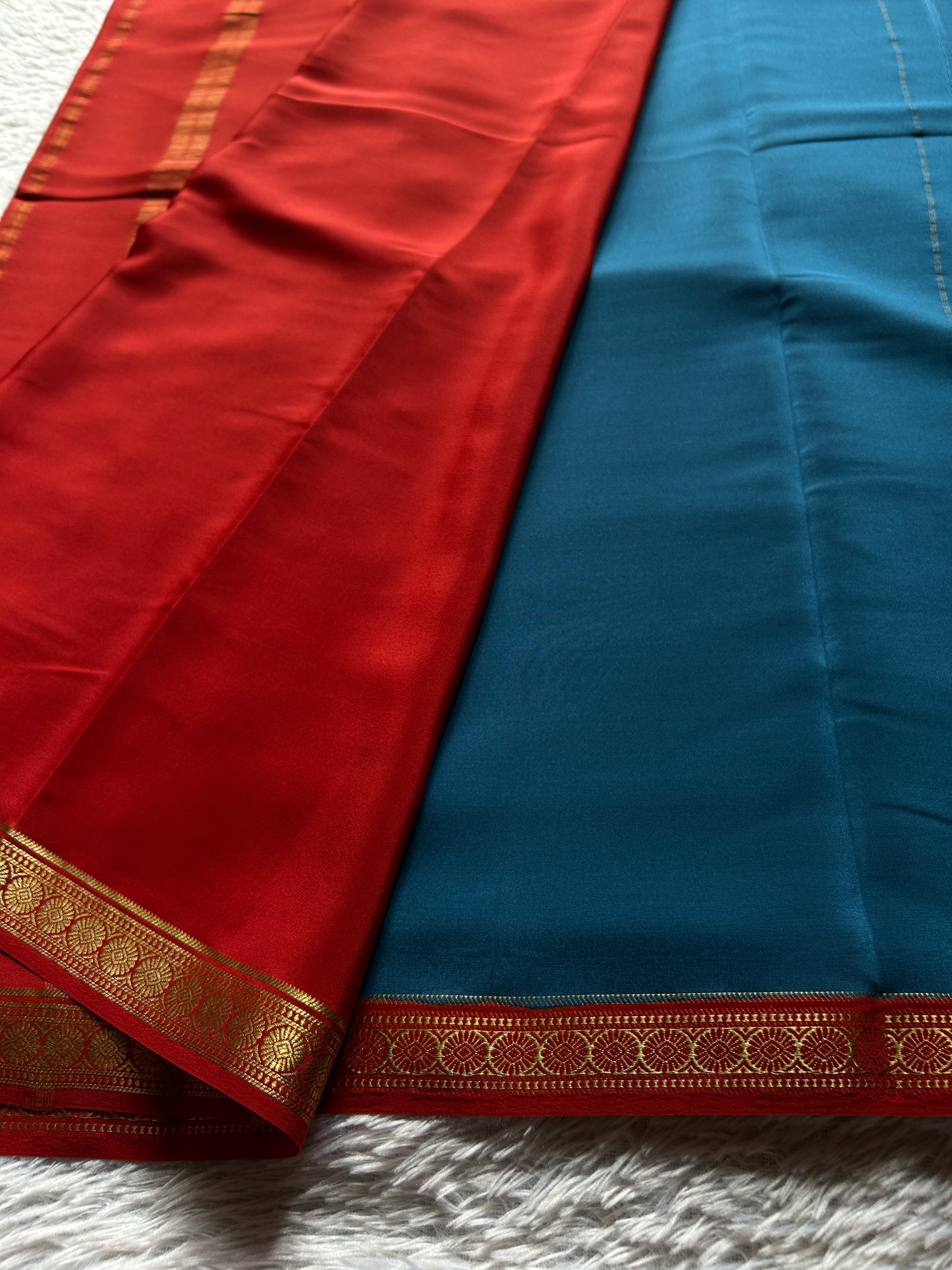 Parijata (2D) : Teal blue-rust red