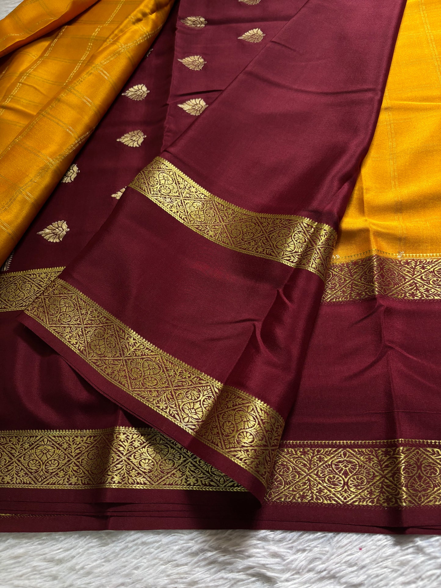 Vasudha (2D) : Golden yellow-maroon