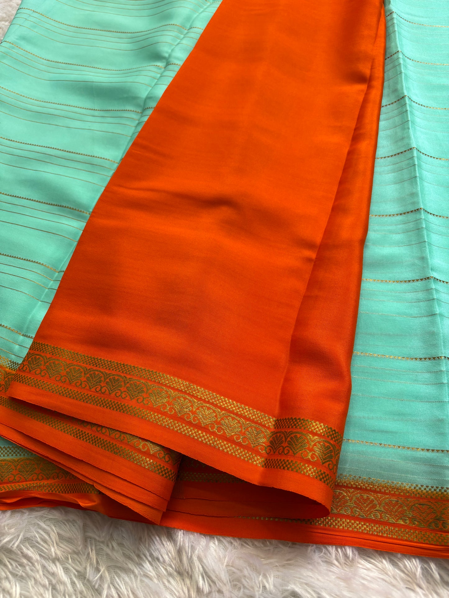 Sakshi (2D) : Sea green-orange