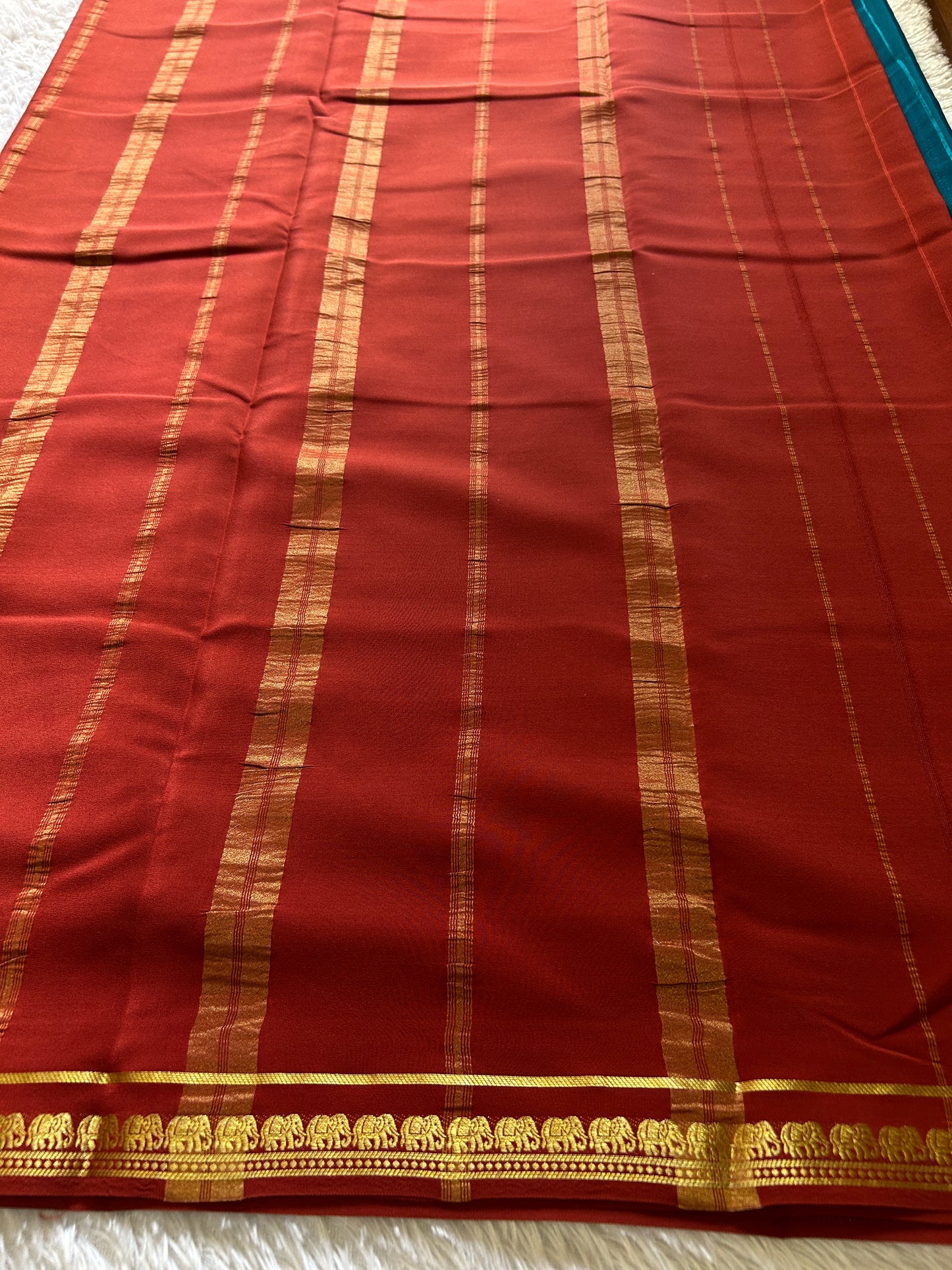 Gamani (2D) : Peacock blue-rust red