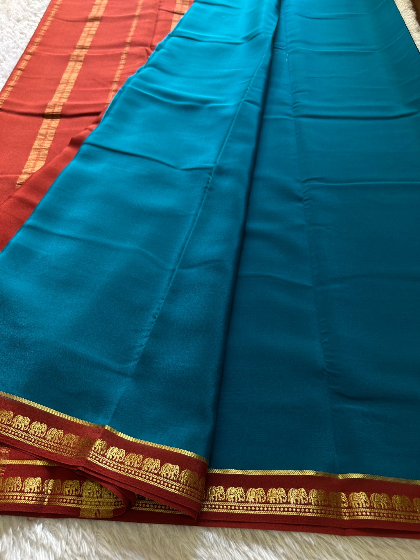 Gamani (2D) : Peacock blue-rust red