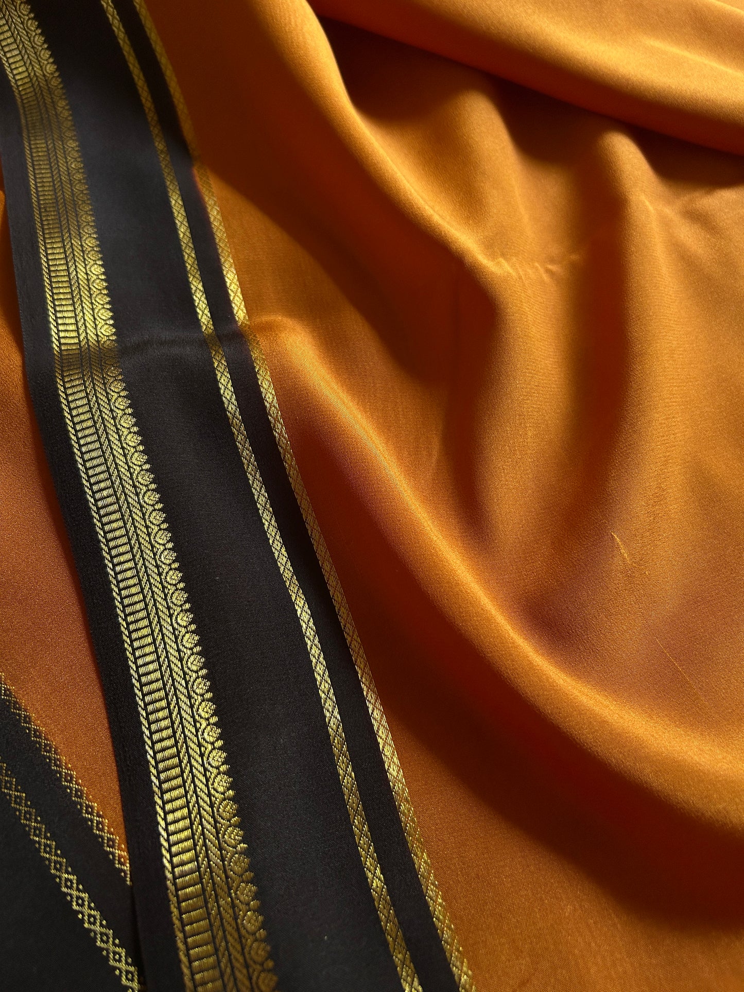 Sumathi (2D) : Burnt orange-black