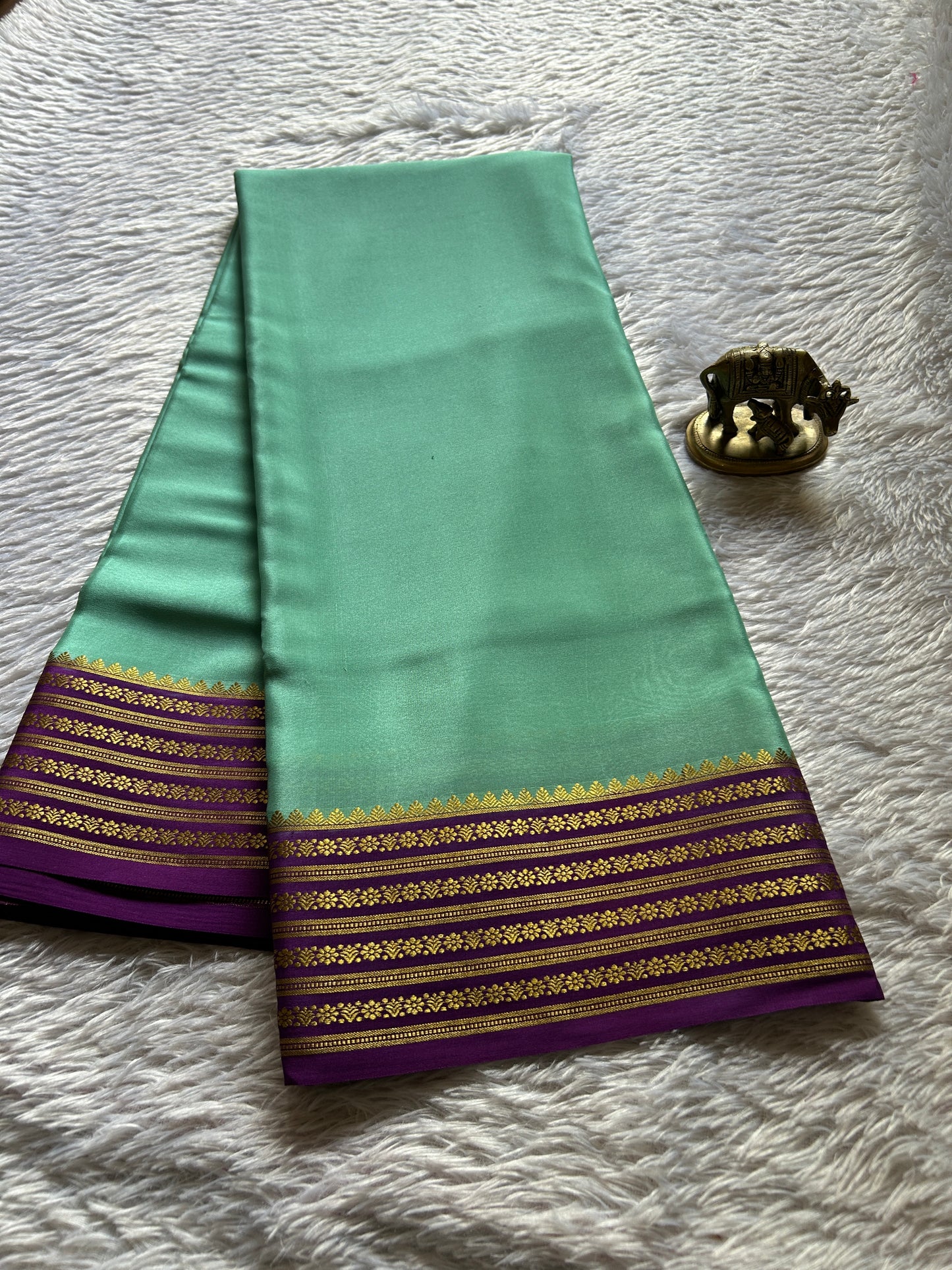 Poornima (2D) : Sea green-purple