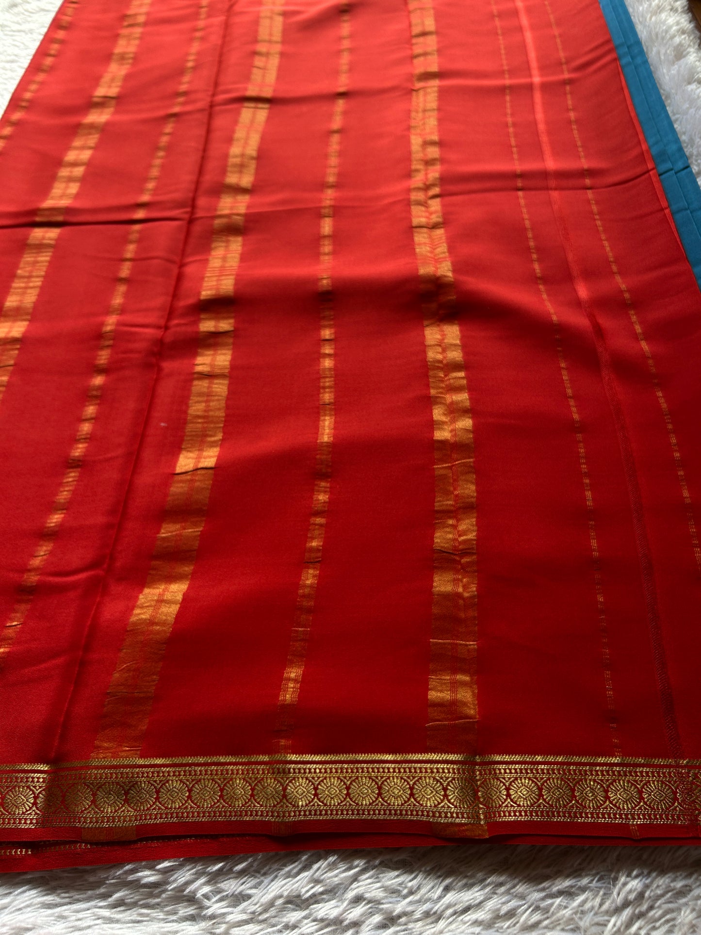 Parijata (2D) : Teal blue-rust red