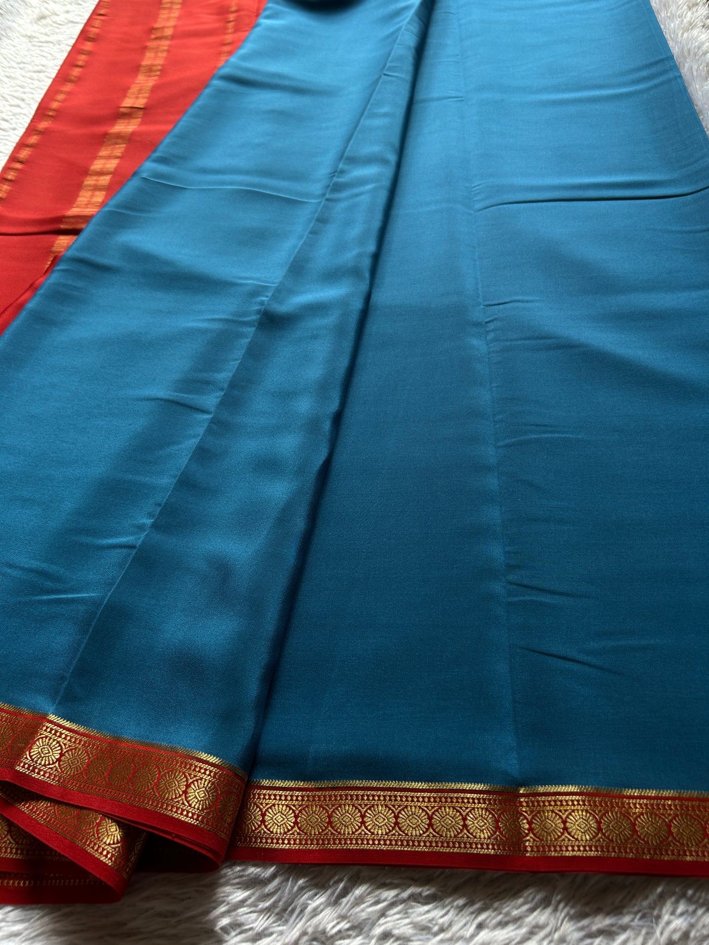 Parijata (2D) : Teal blue-rust red