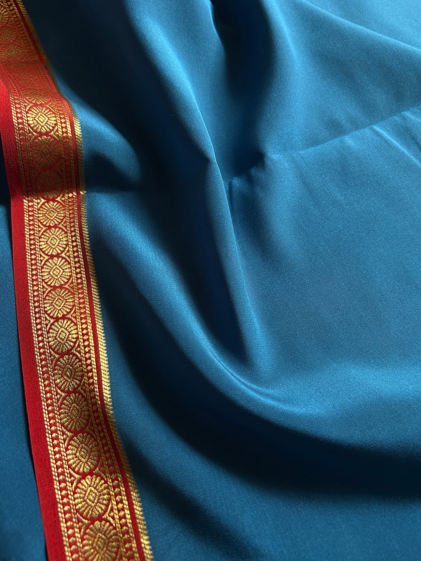 Parijata (2D) : Teal blue-rust red