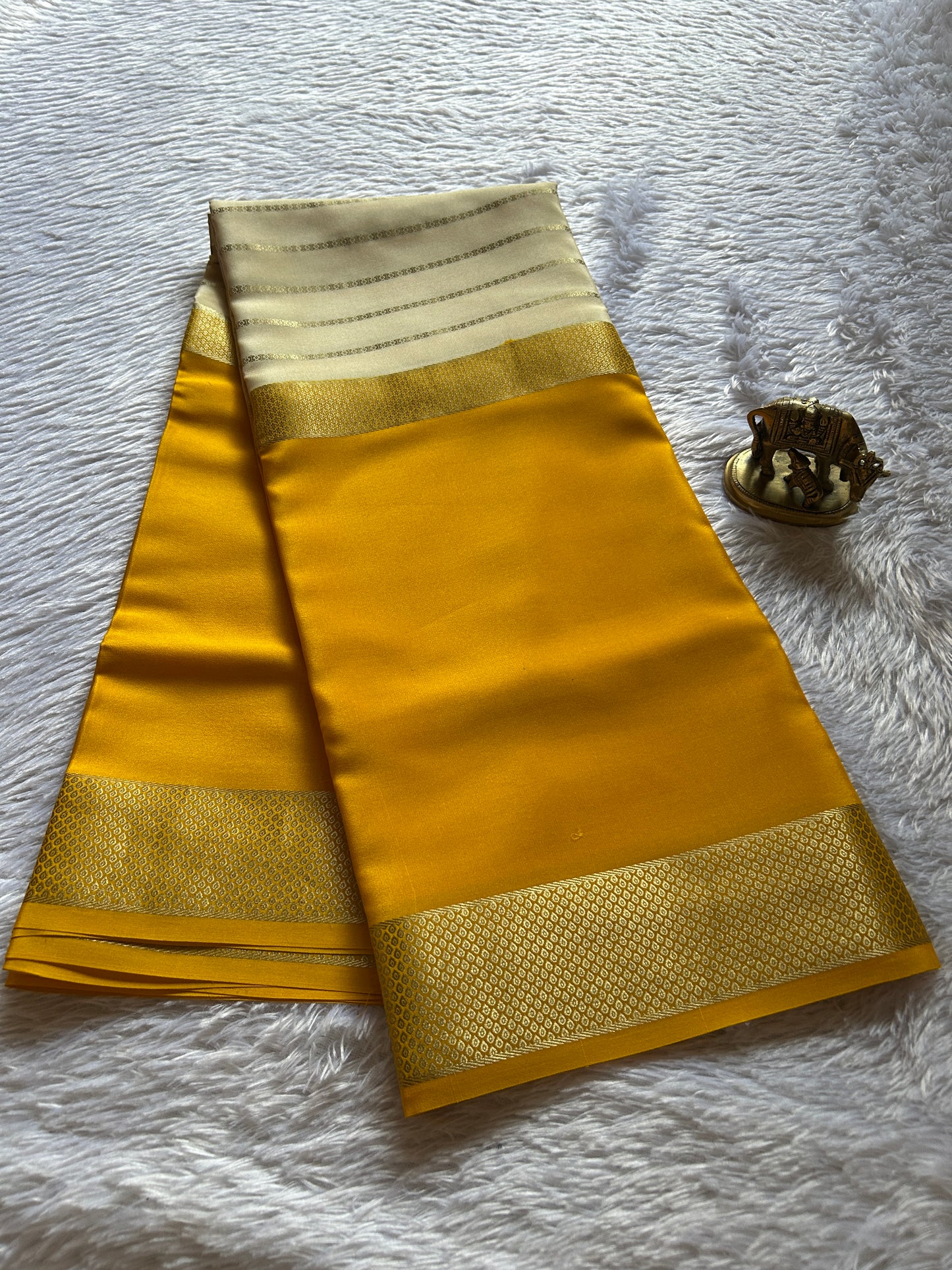 Kavya (2D) : Golden yellow-off white
