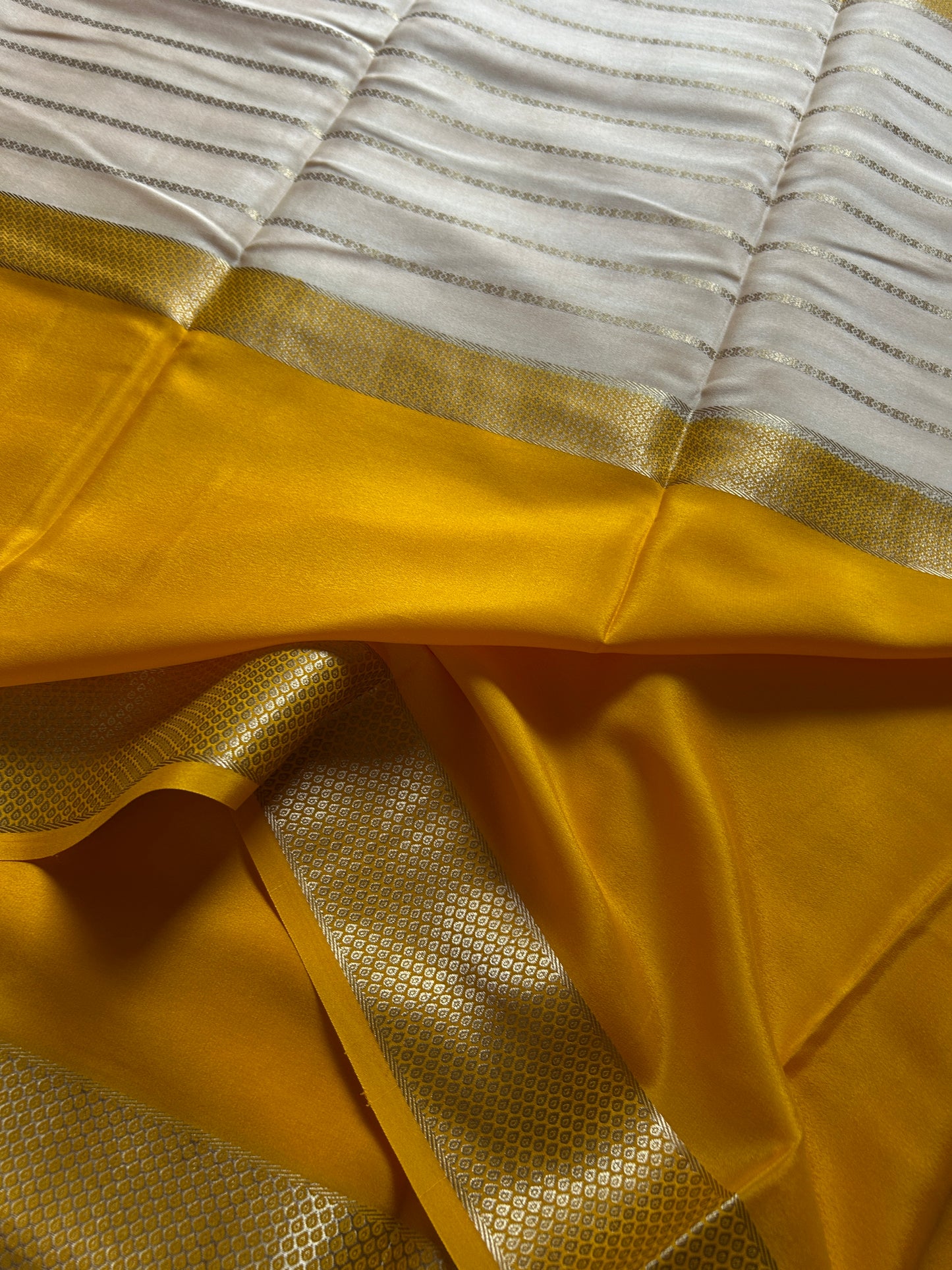 Kavya (2D) : Golden yellow-off white