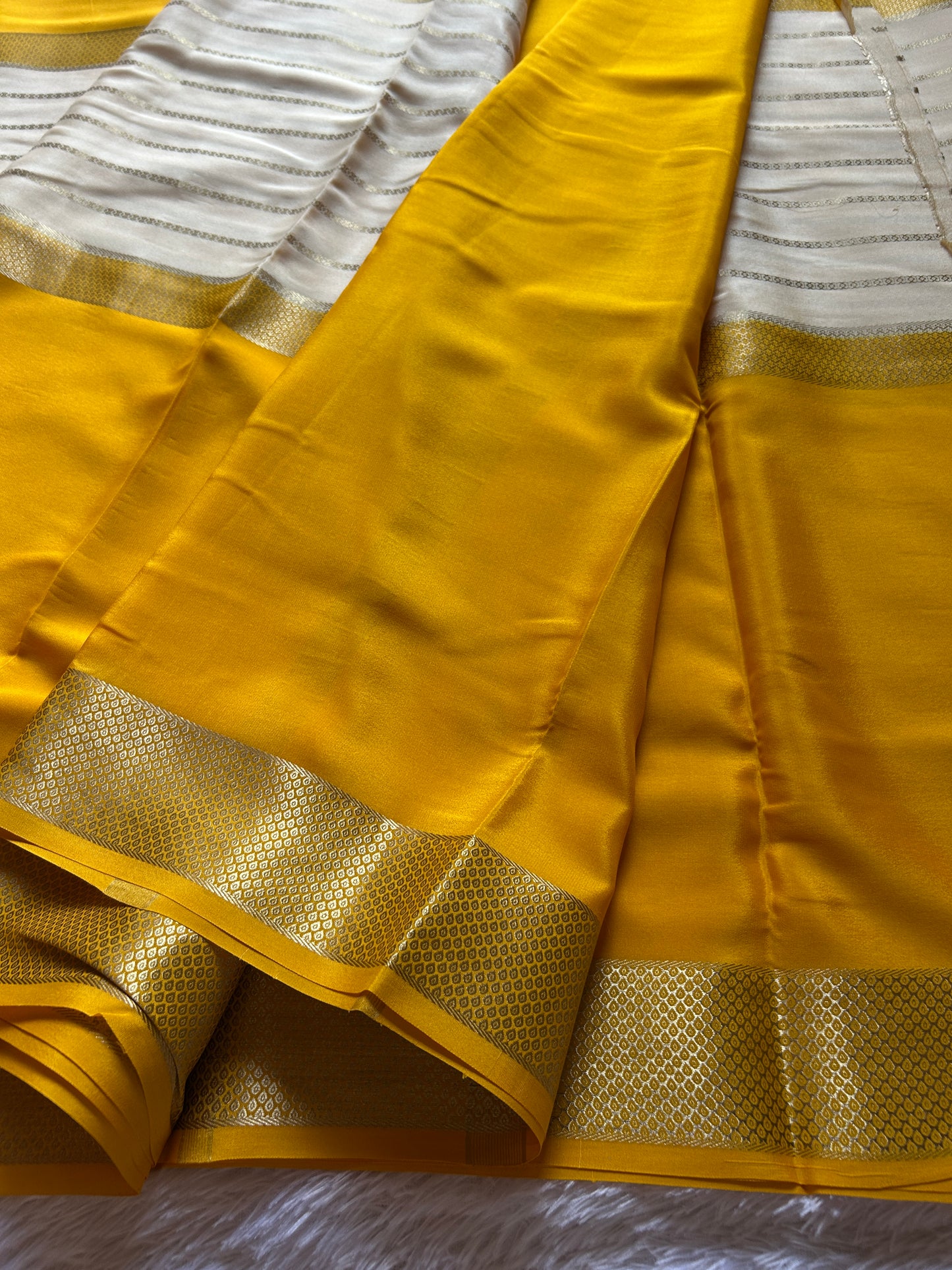 Kavya (2D) : Golden yellow-off white