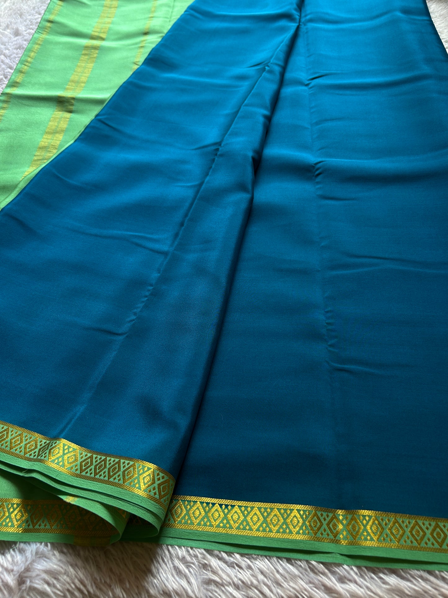 Nikhila (2D) : Teal blue-mint green