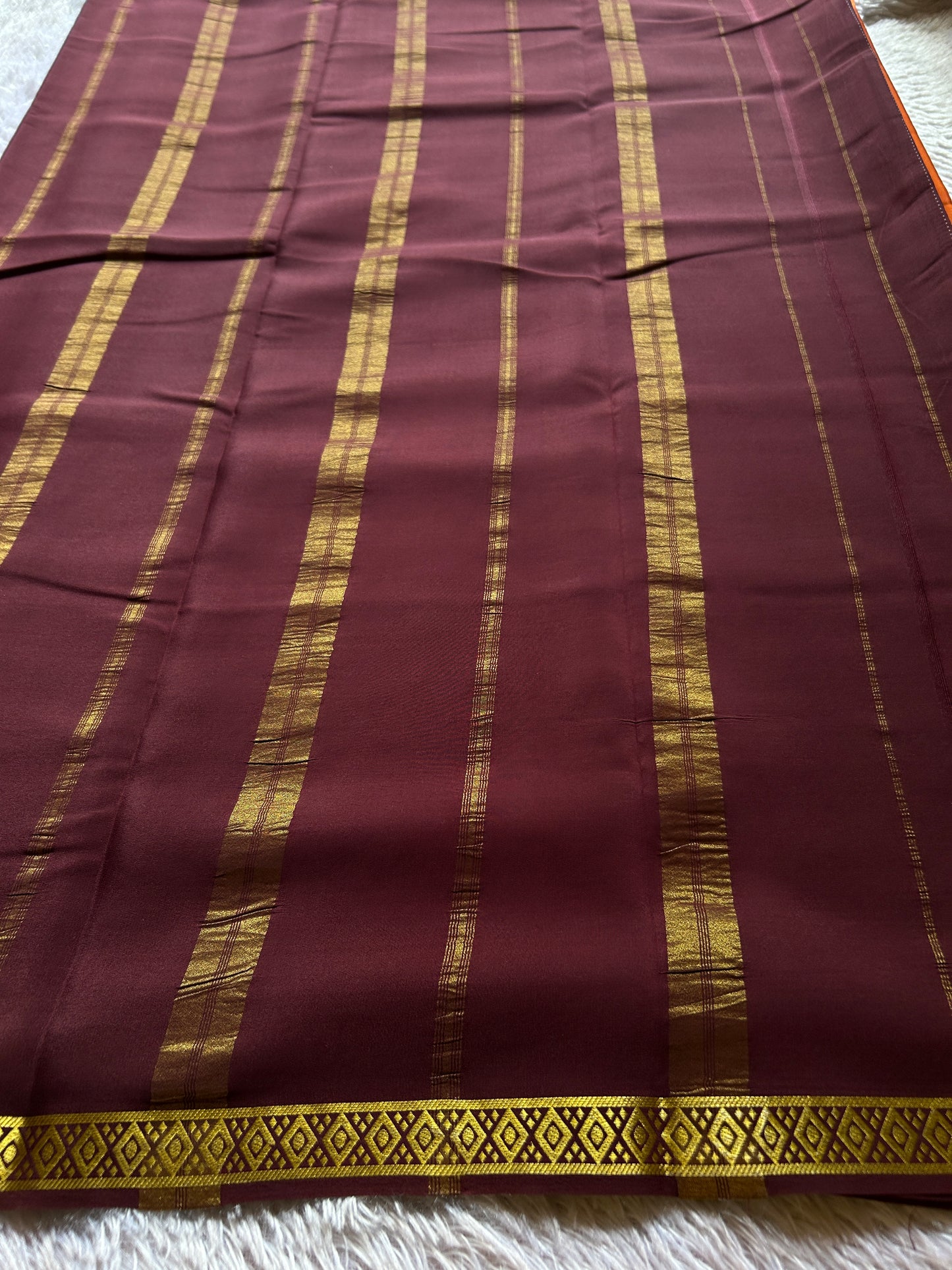 Nikhila (2D) : Rust orange-chocolate brown