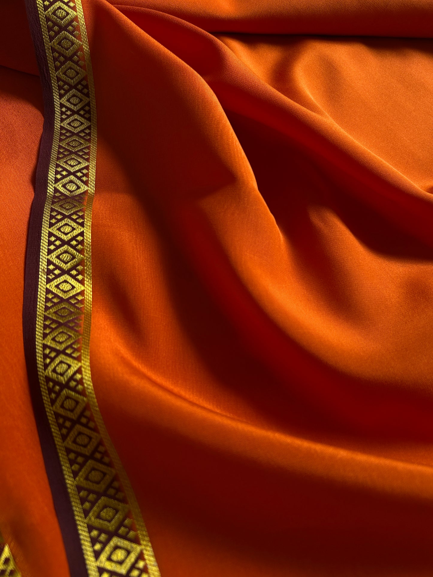 Nikhila (2D) : Rust orange-chocolate brown