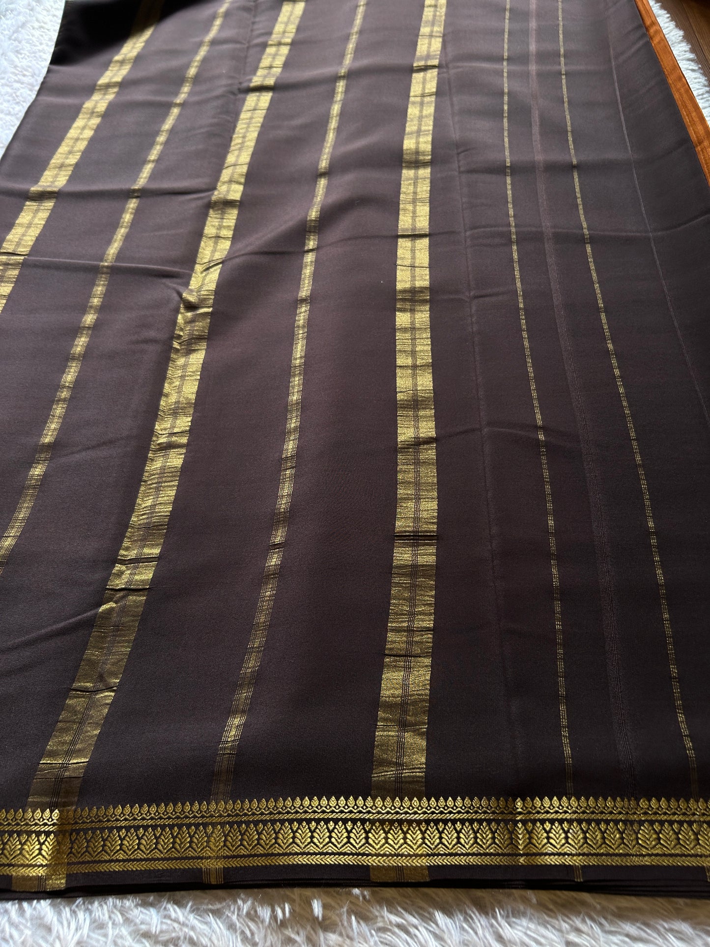 Jyothi (2D) : Burnt orange-brown
