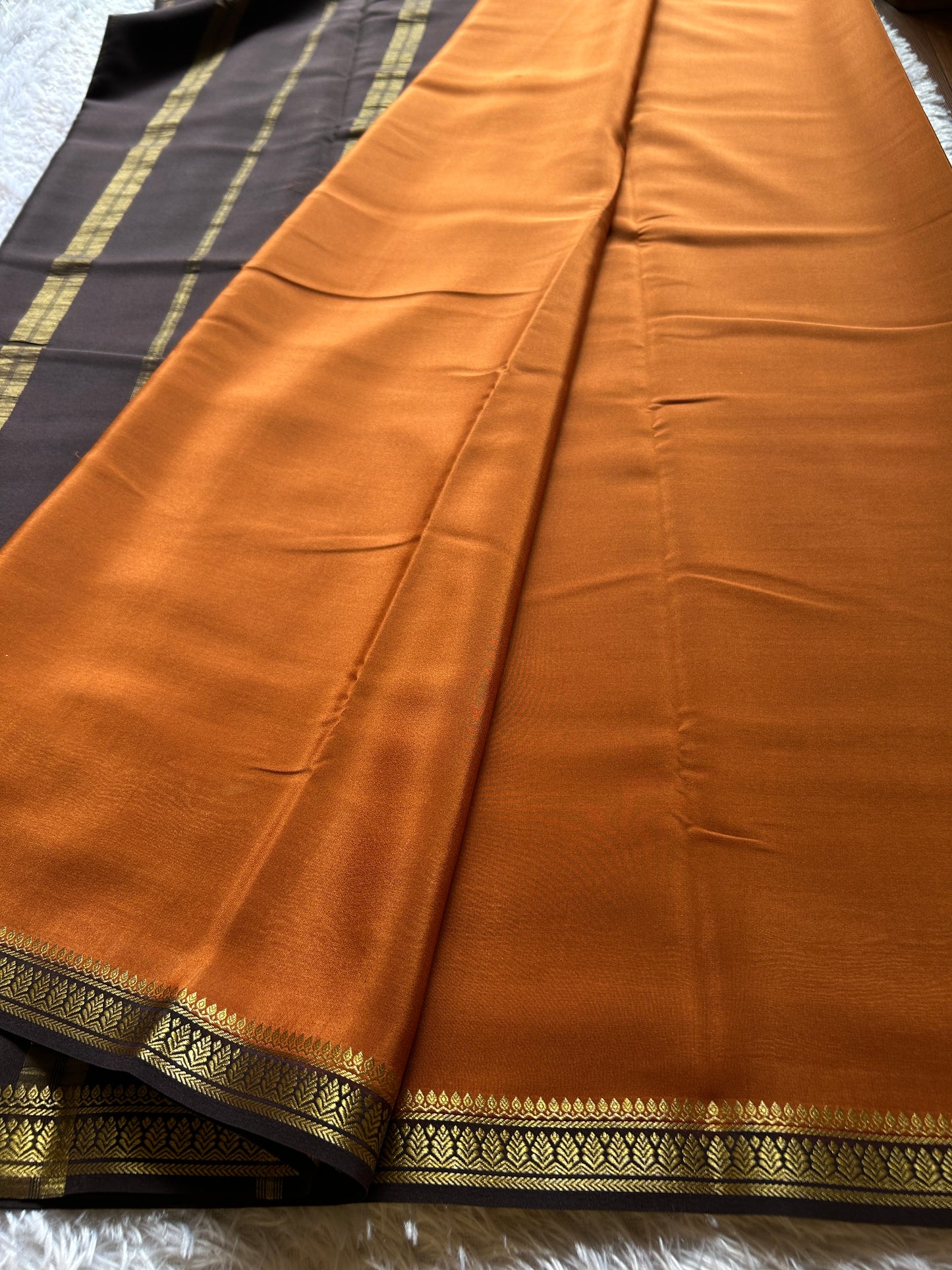 Jyothi (2D) : Burnt orange-brown