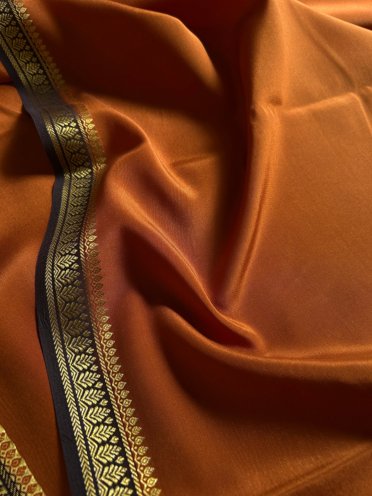 Jyothi (2D) : Burnt orange-brown