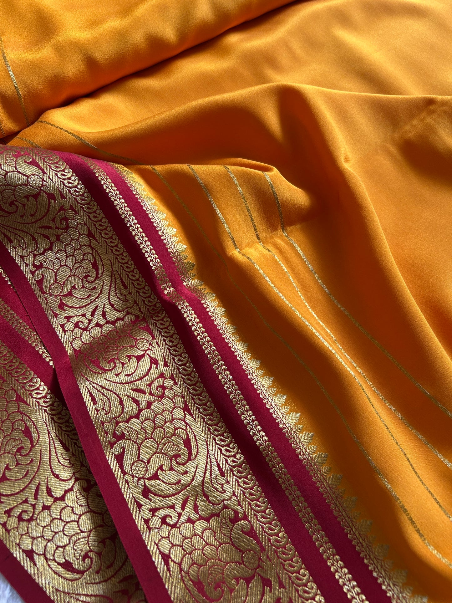 Dakshayini (2D) : Golden yellow-maroon