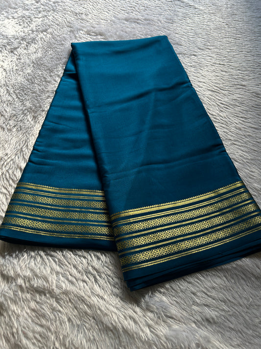 Pushpa : Solid teal
