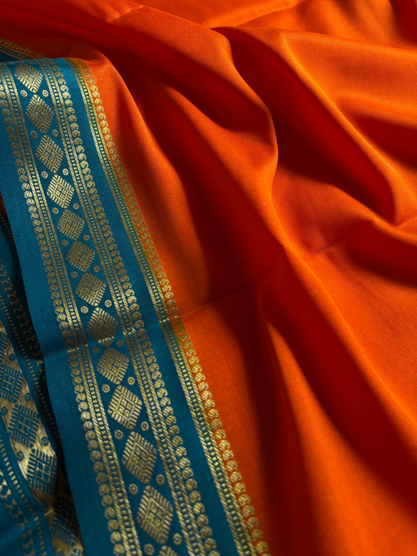 Saanvi (2D) : Orange-teal blue