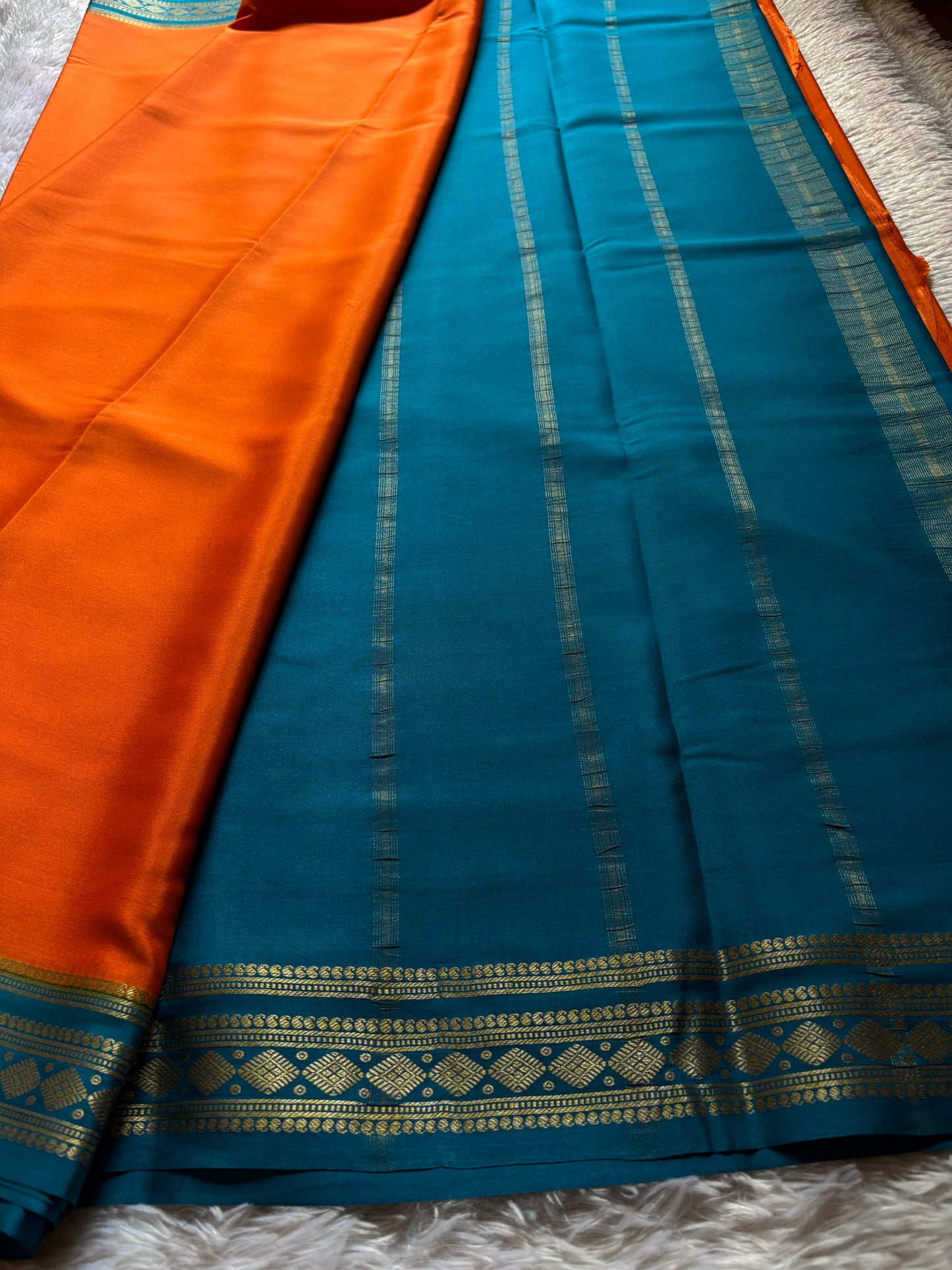 Saanvi (2D) : Orange-teal blue