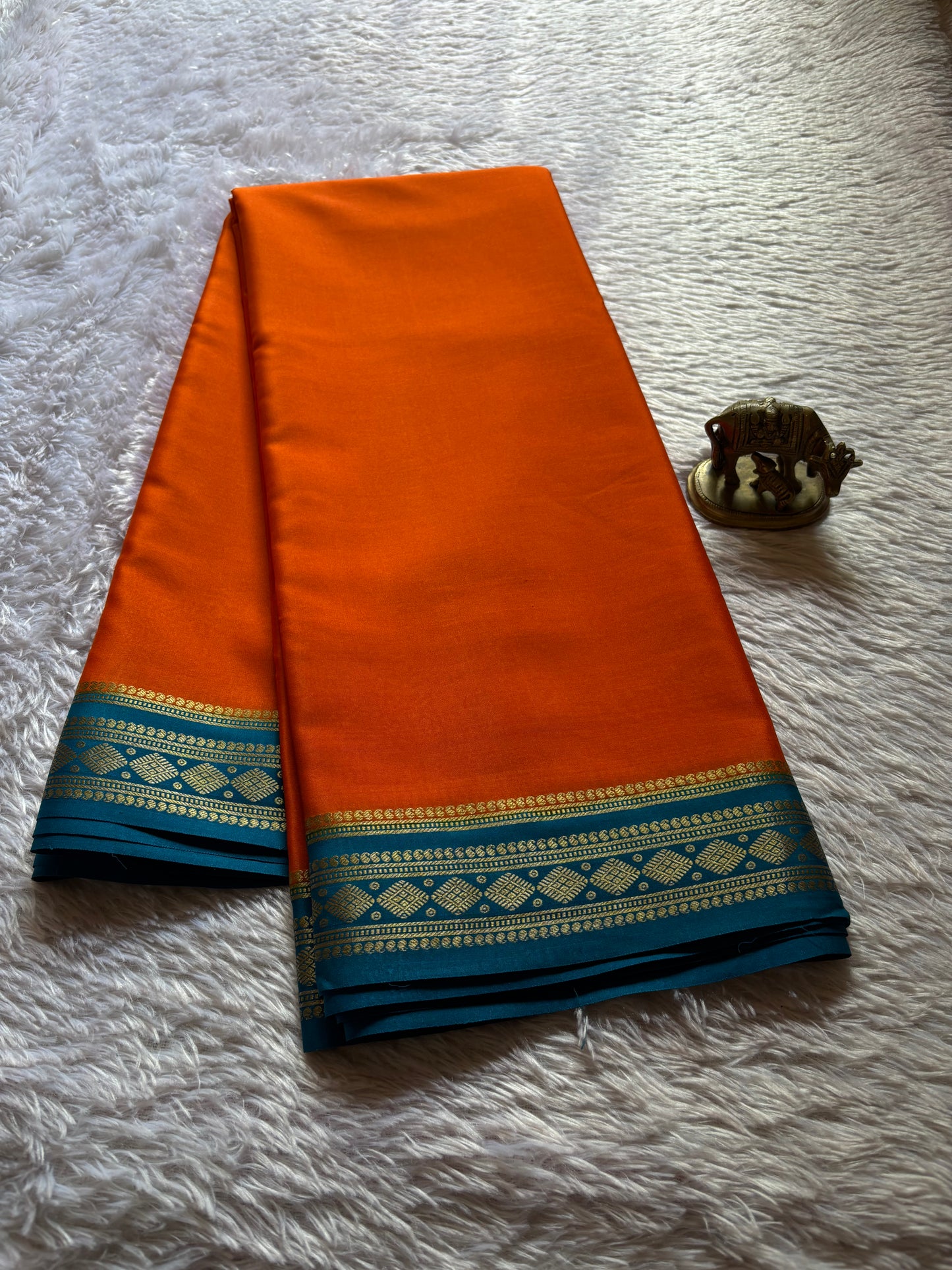 Saanvi (2D) : Orange-teal blue