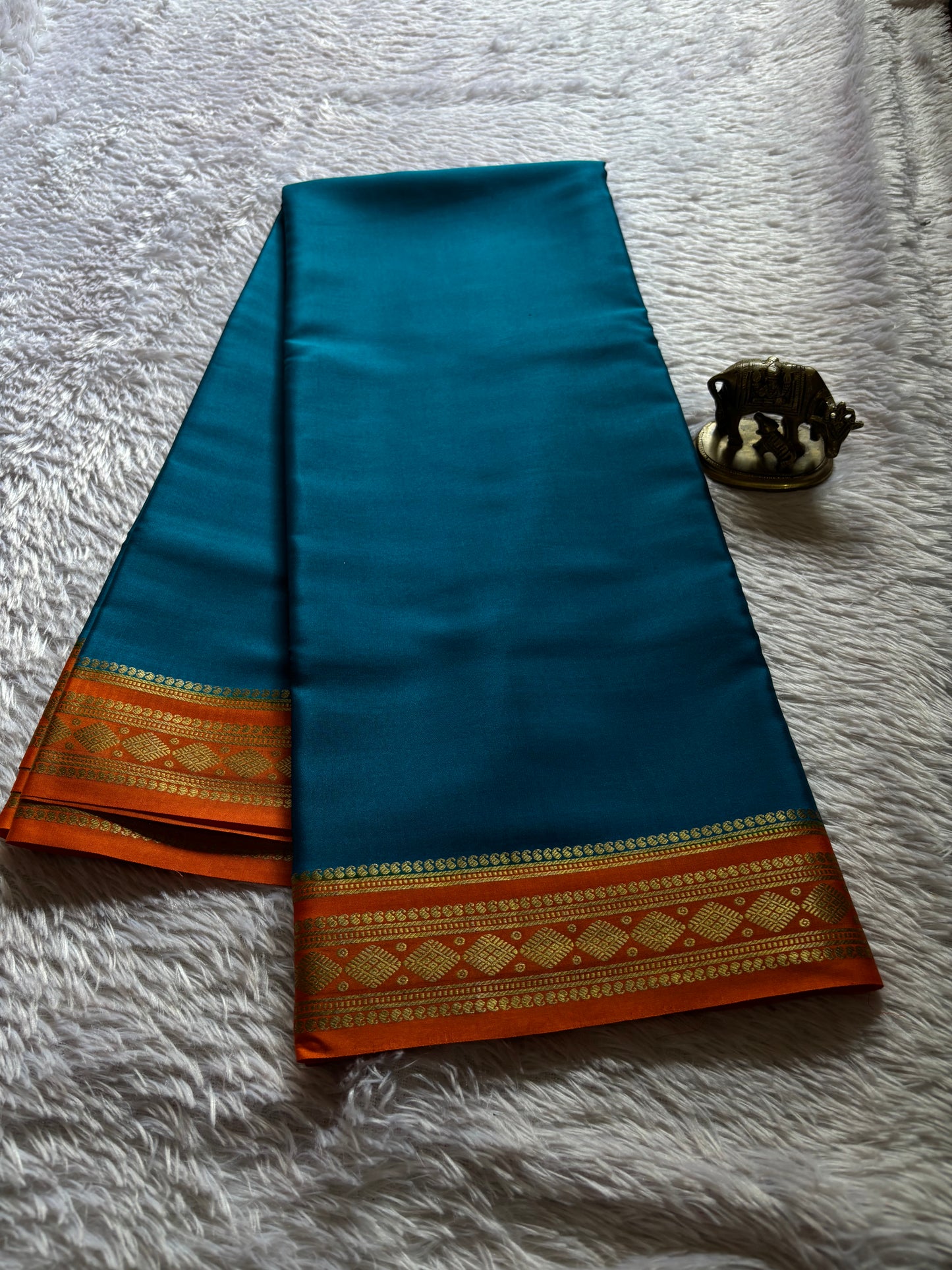Saanvi (2D) : Teal blue-orange
