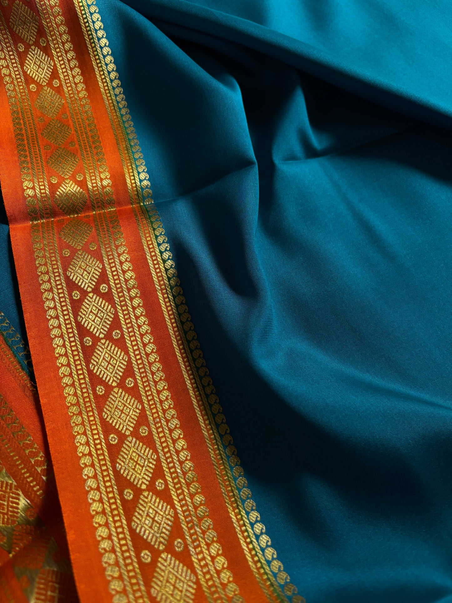 Saanvi (2D) : Teal blue-orange