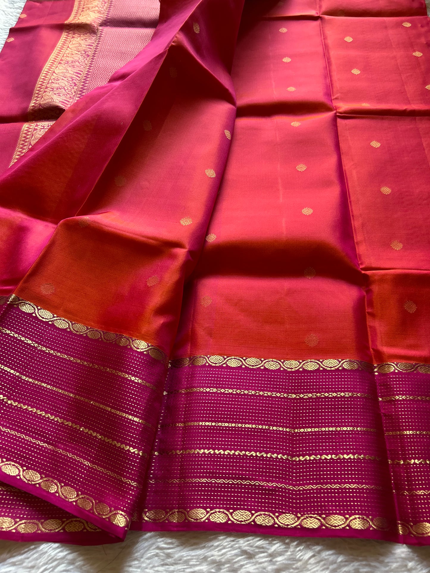 Parvathi (2D) : Pinkish orange-pink