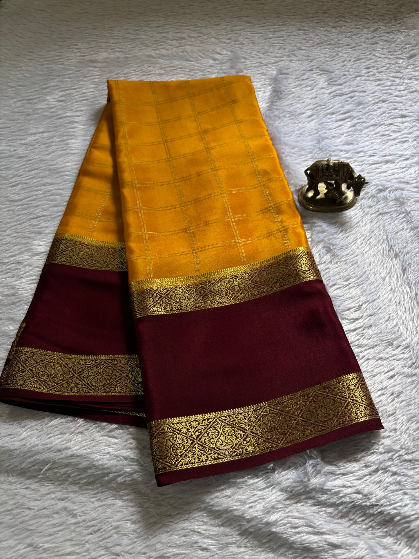 Vasudha (2D) : Golden yellow-maroon