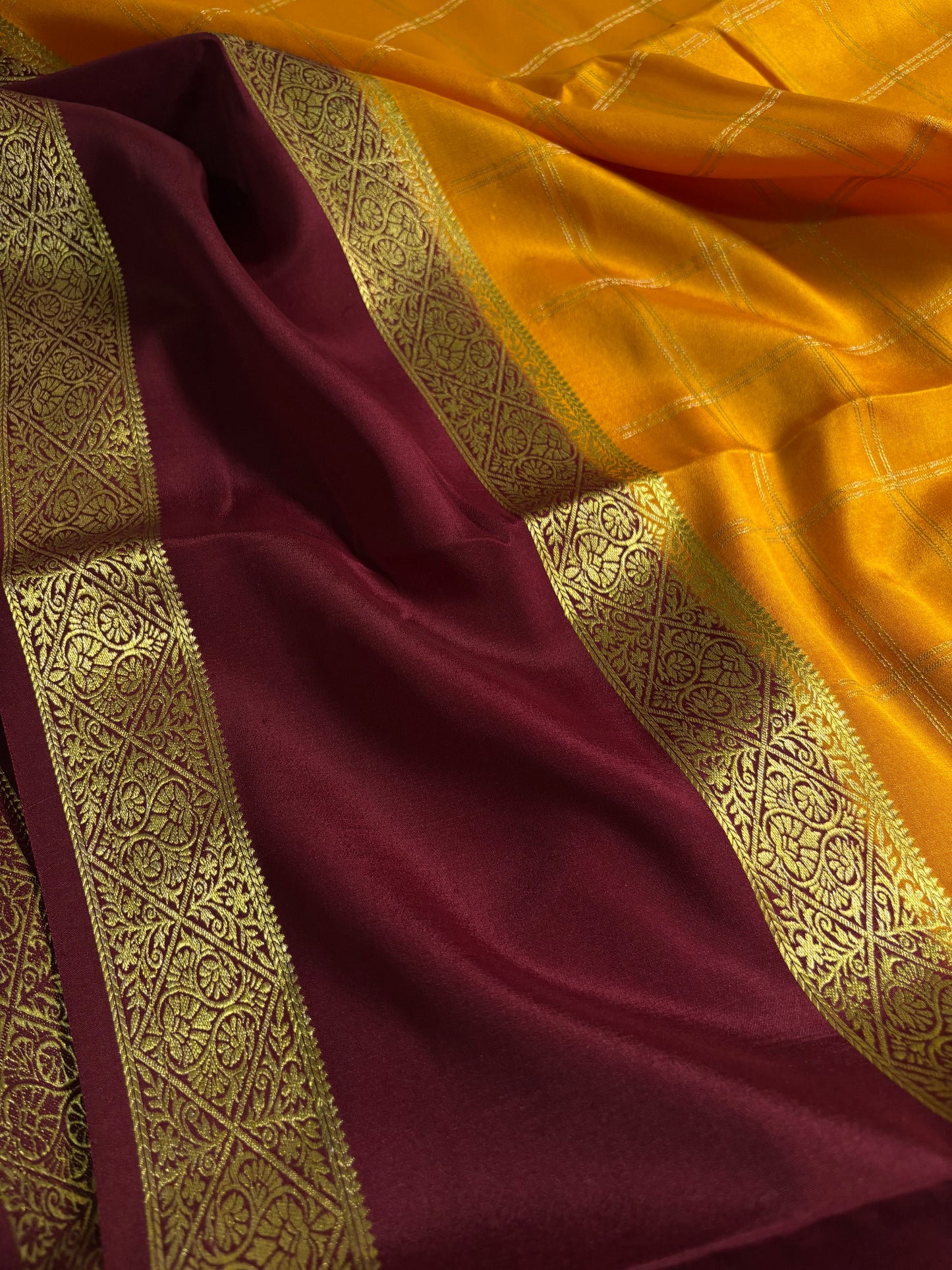 Vasudha (2D) : Golden yellow-maroon