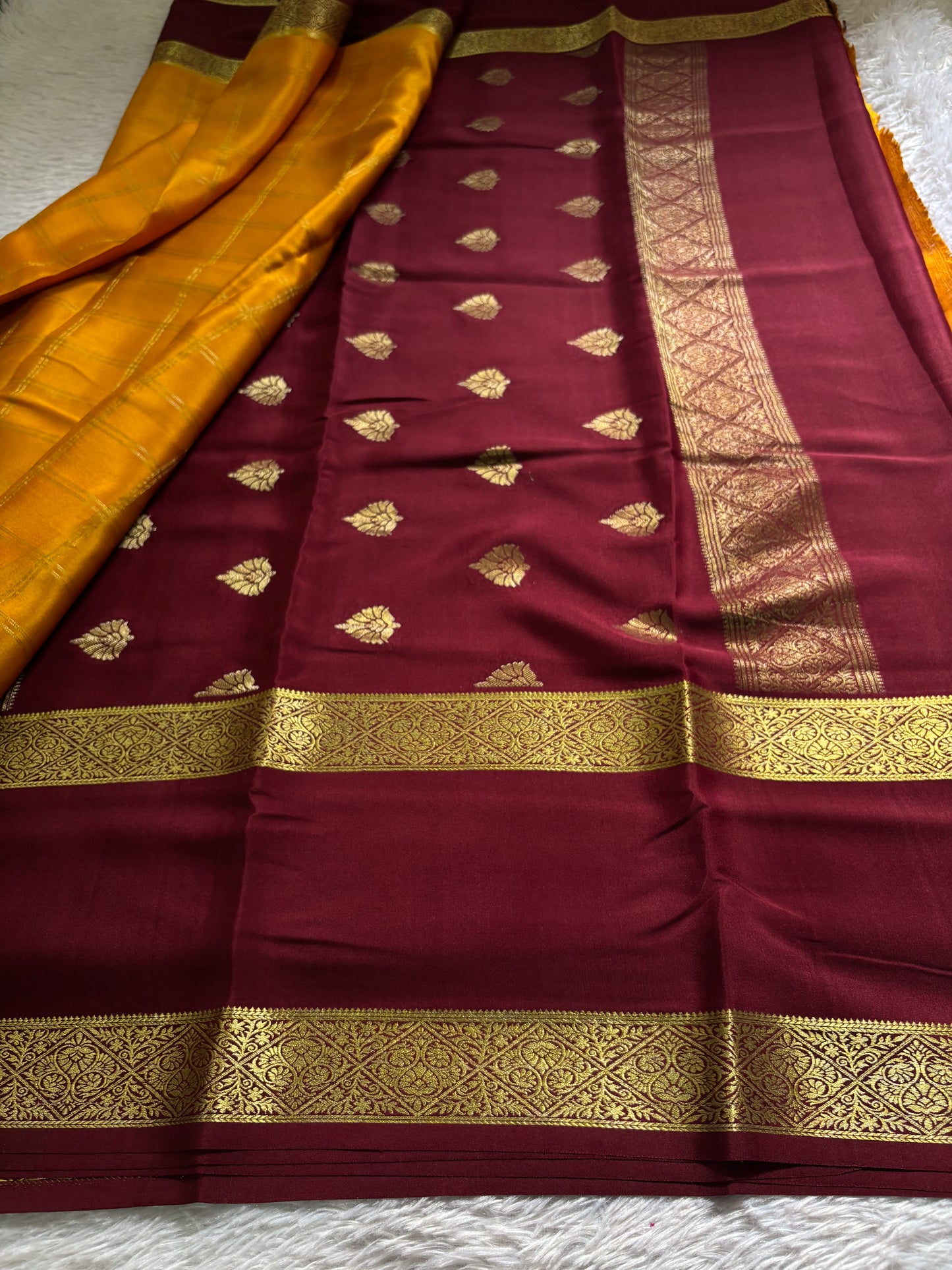 Vasudha (2D) : Golden yellow-maroon
