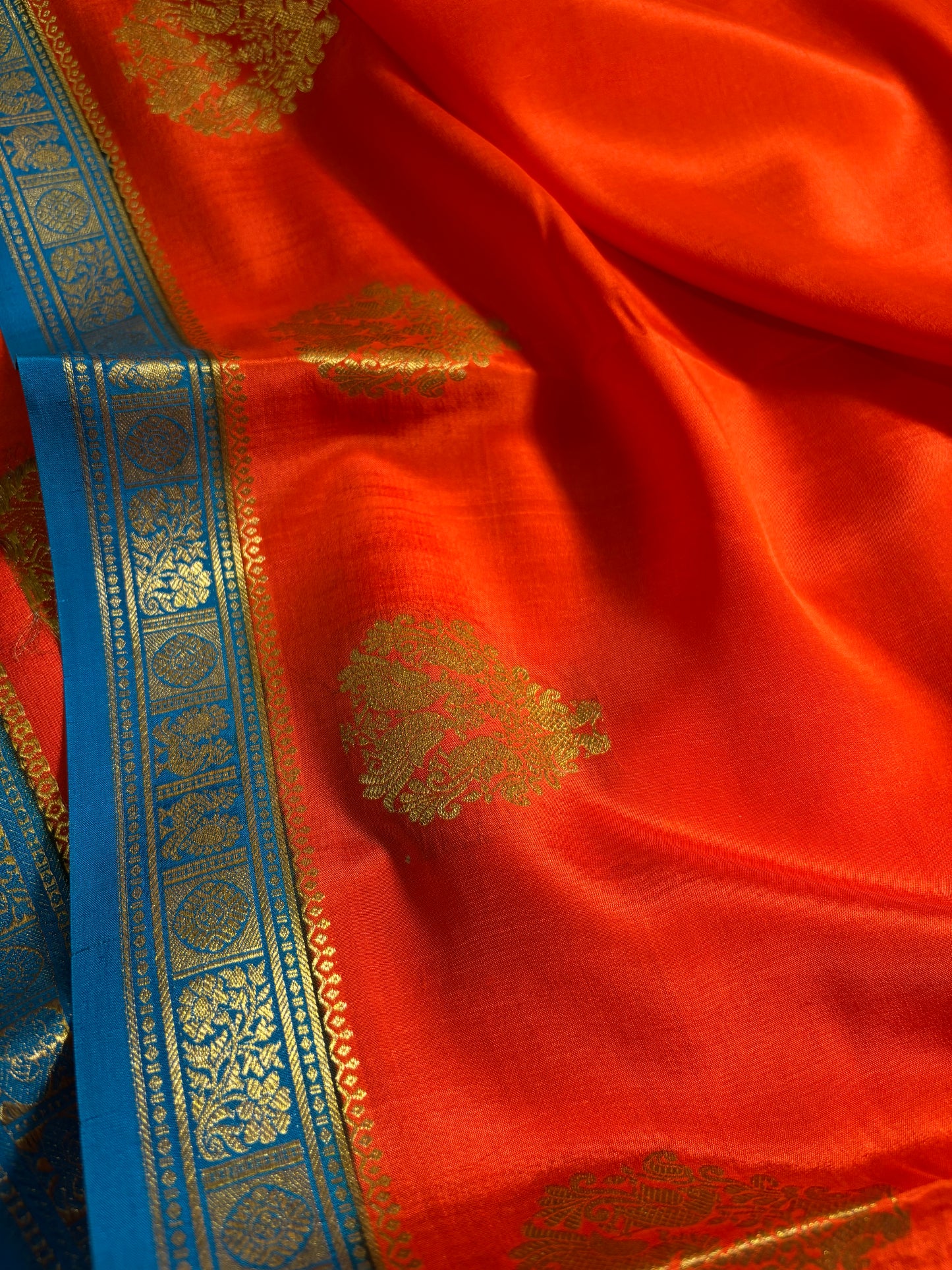 Pragathi (2D) : Dark orange-dark ananda blue