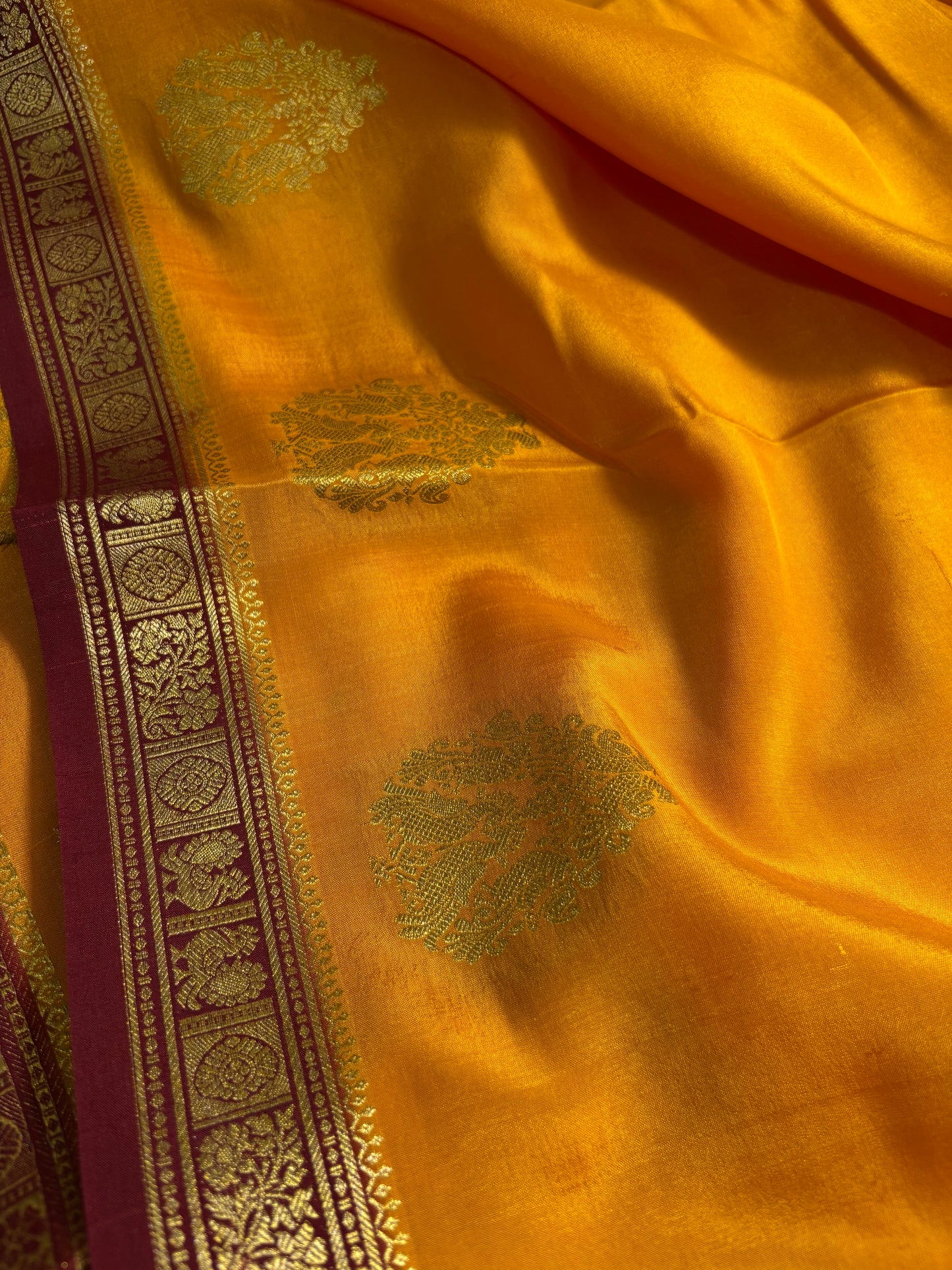 Pragathi (2D) : Golden yellow-maroon
