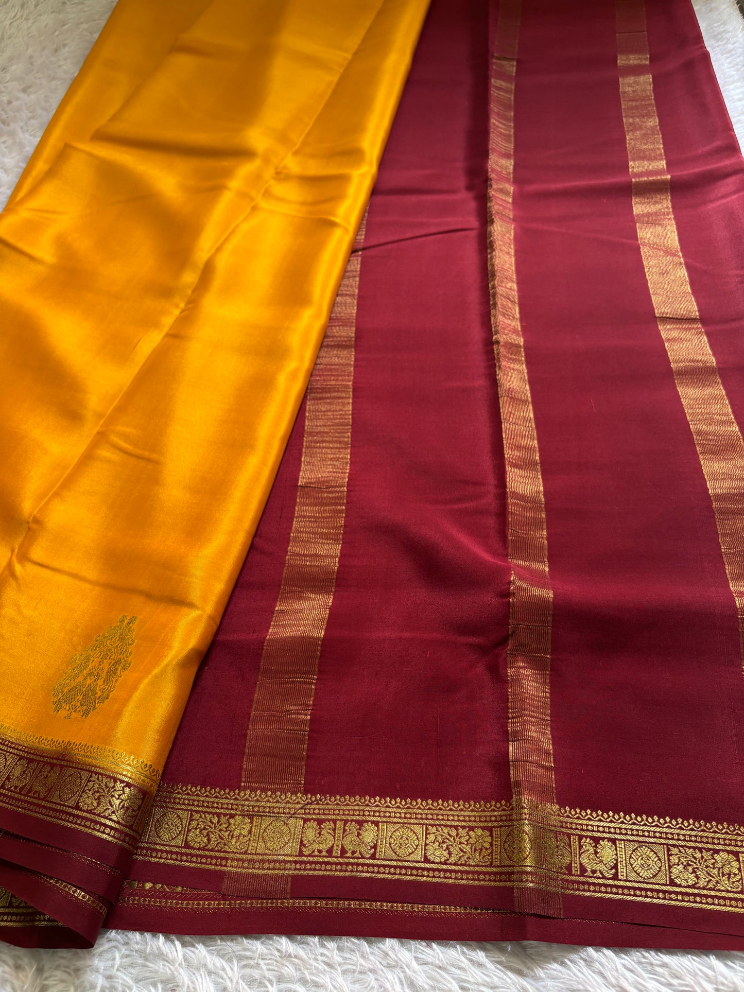 Pragathi (2D) : Golden yellow-maroon
