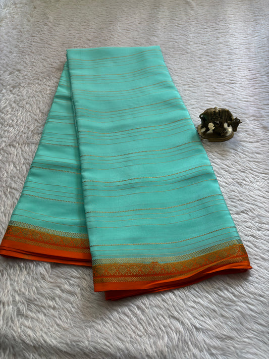 Sakshi (2D) : Sea green-orange