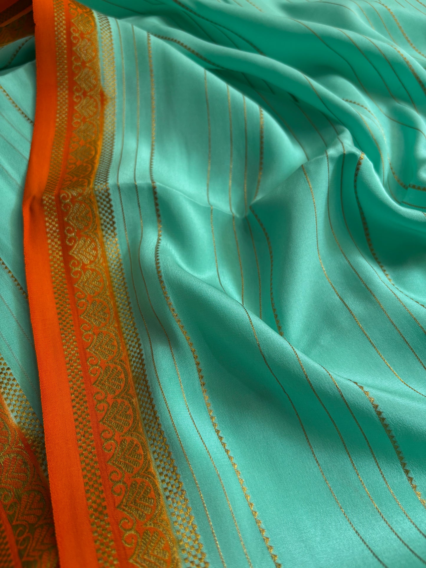 Sakshi (2D) : Sea green-orange