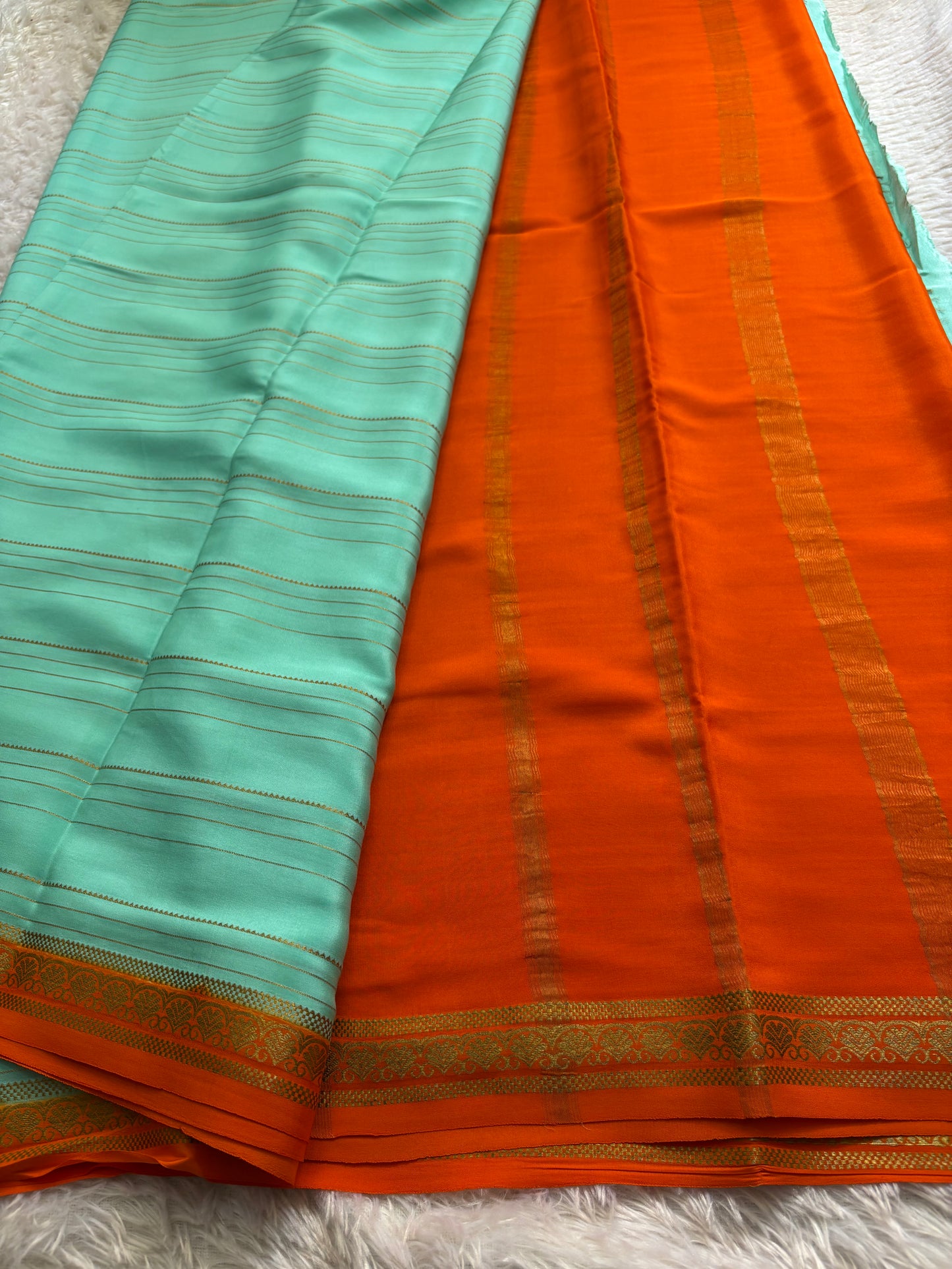 Sakshi (2D) : Sea green-orange