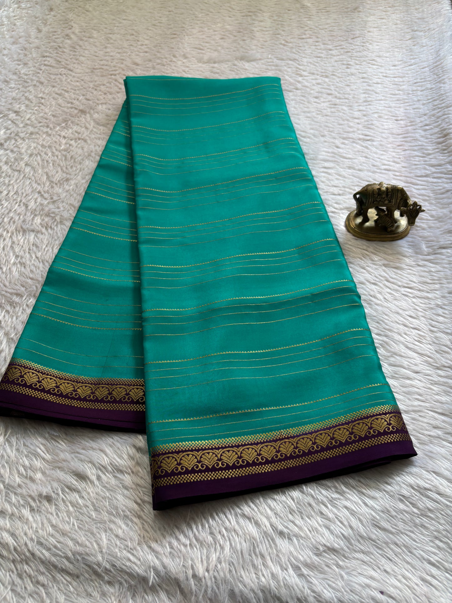Sakshi (2D) : Rama green-plum