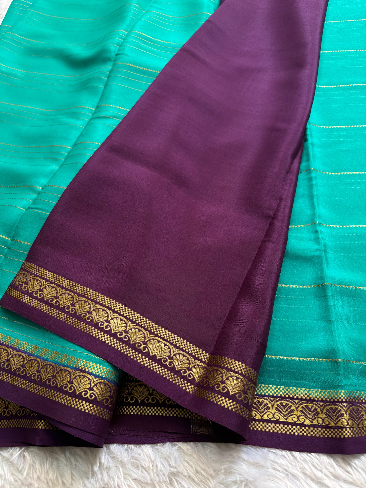 Sakshi (2D) : Rama green-plum