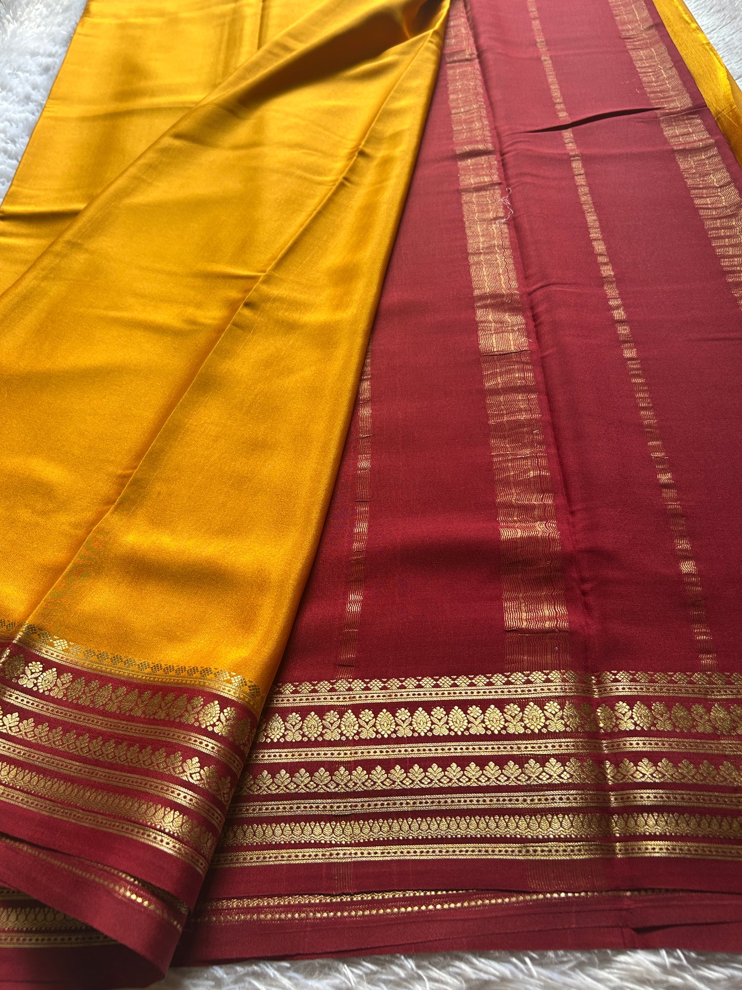Manasa (2D) : Golden yellow-maroon