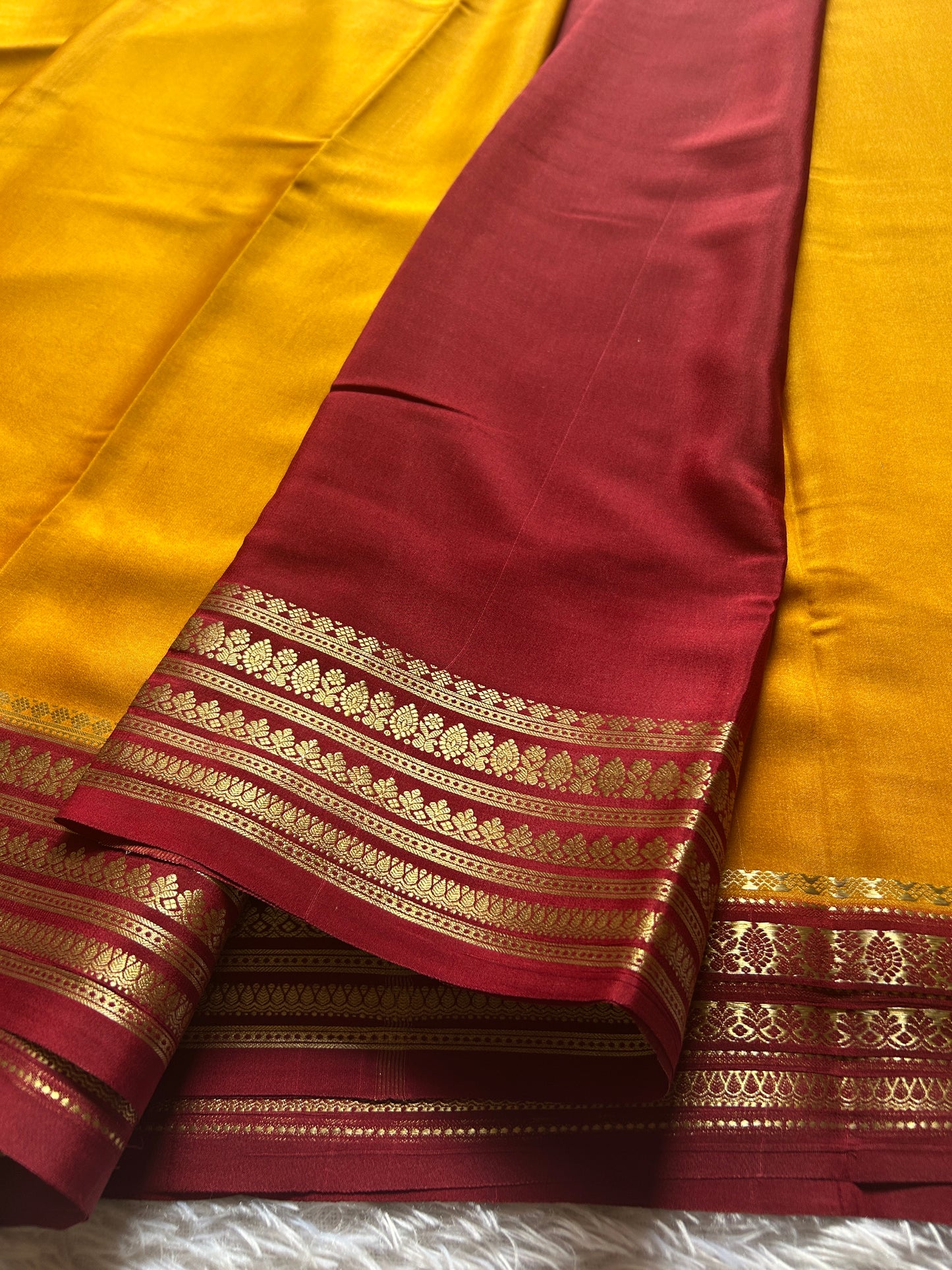 Manasa (2D) : Golden yellow-maroon