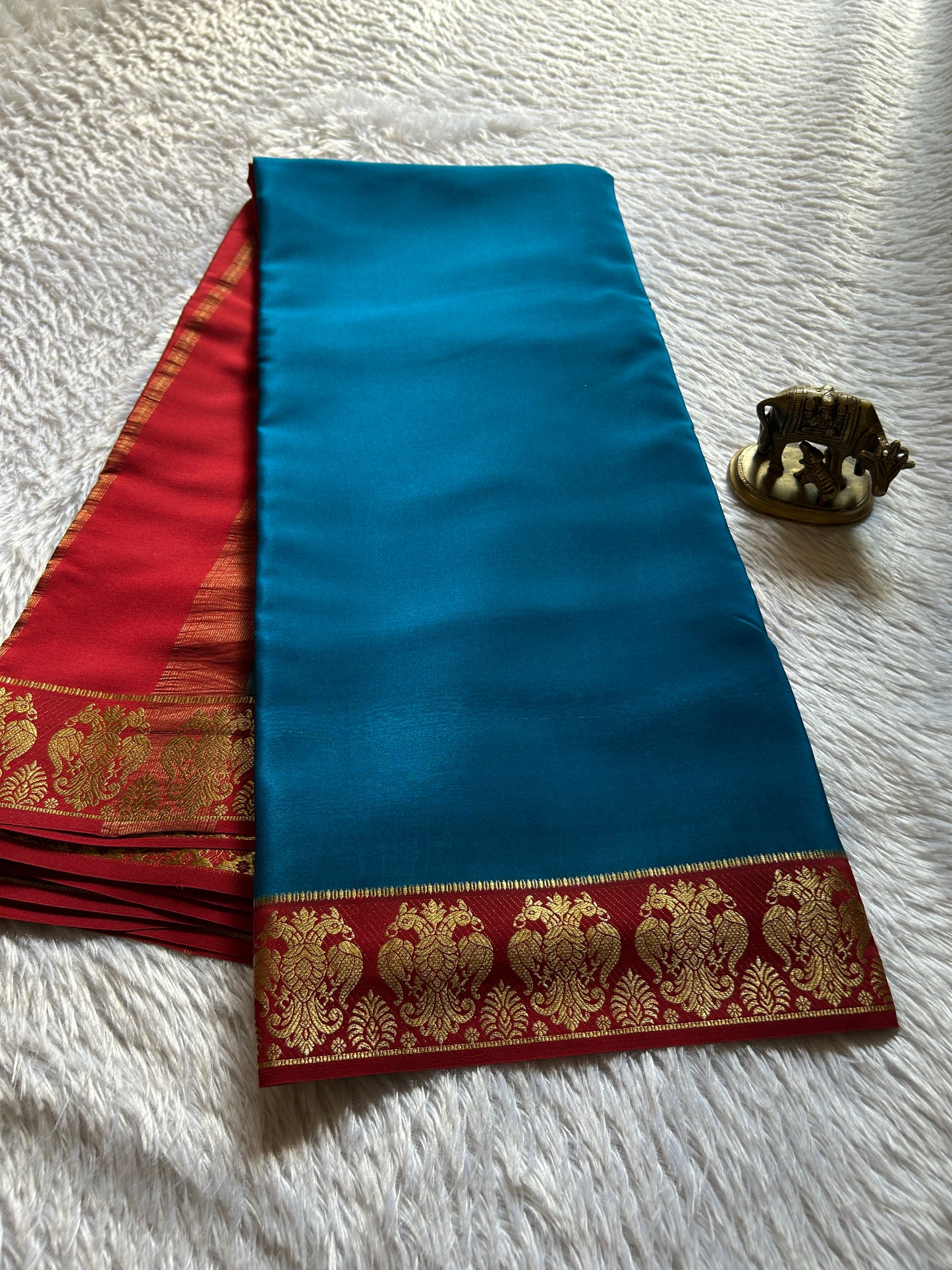 Veera (2D) : Peacock blue-rust red
