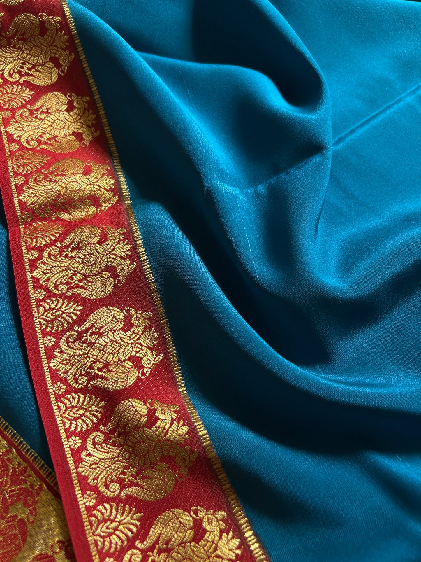 Veera (2D) : Peacock blue-rust red